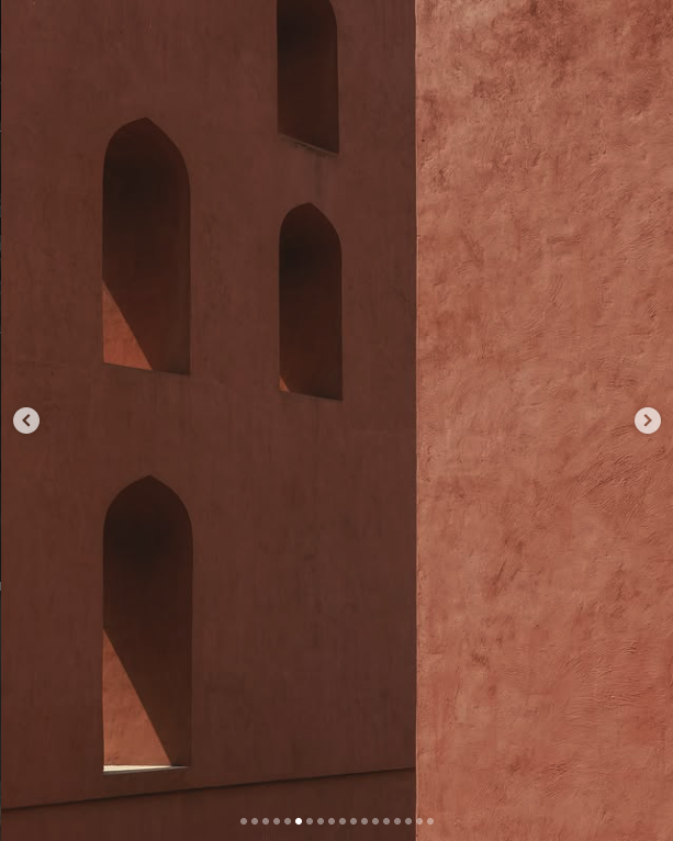 Terracotta architecture with deep arched windows