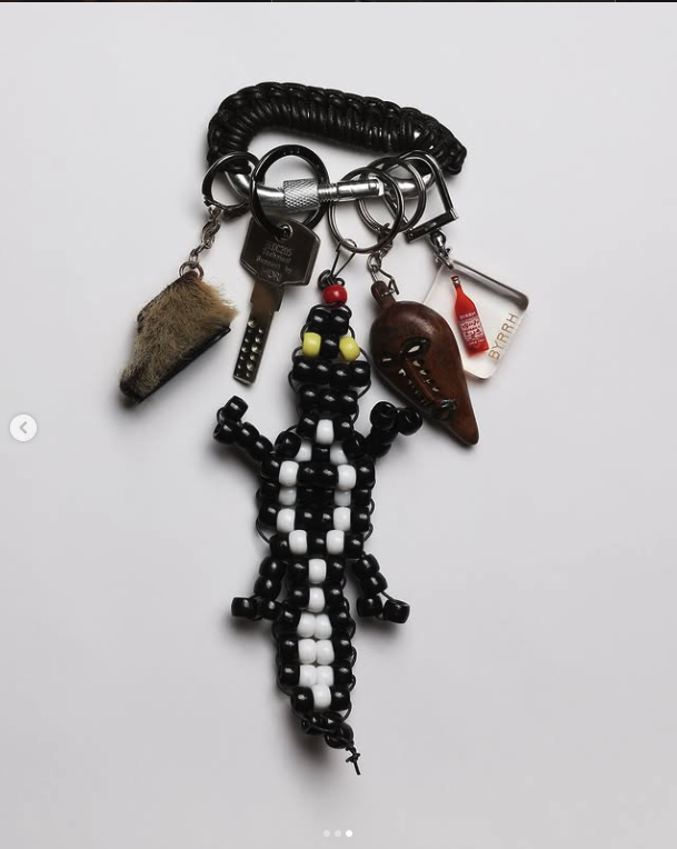 Collected keychain with beadwork, charms and small found objects
