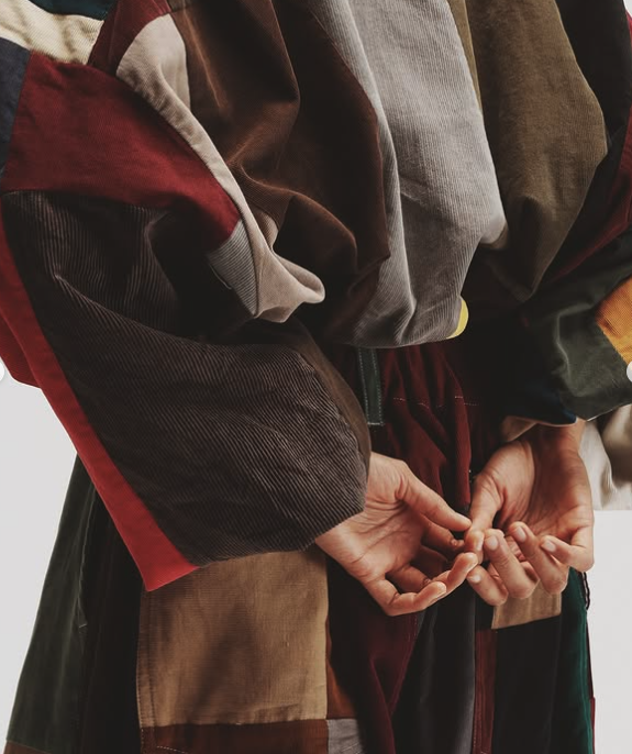 Close view of multicolour patchwork corduroy garments