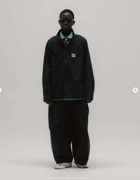 Front view of an oversized black trouser silhouette